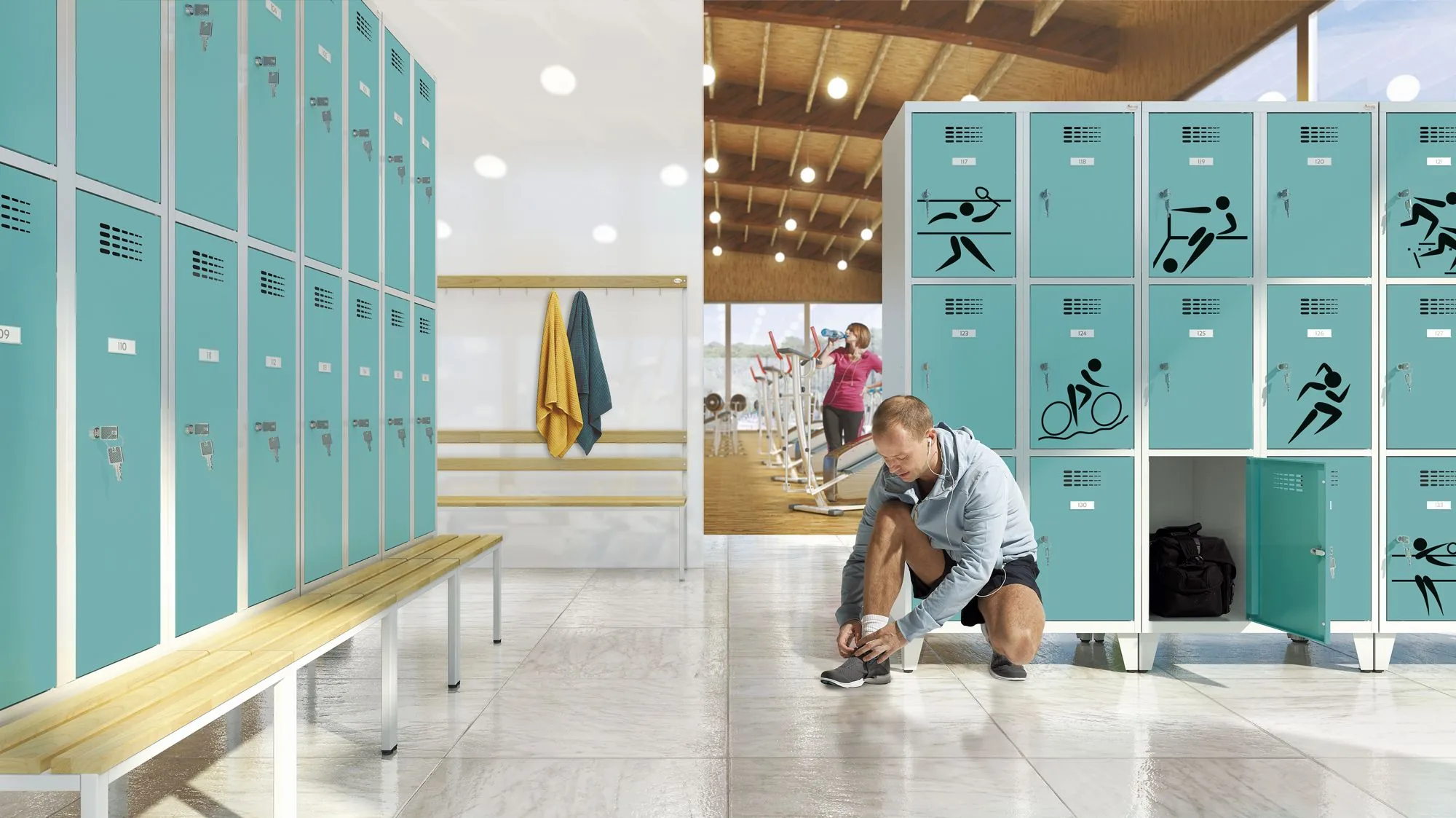 Turkusowe szafki skrytkowe SUS w przebieralni klubu fitness